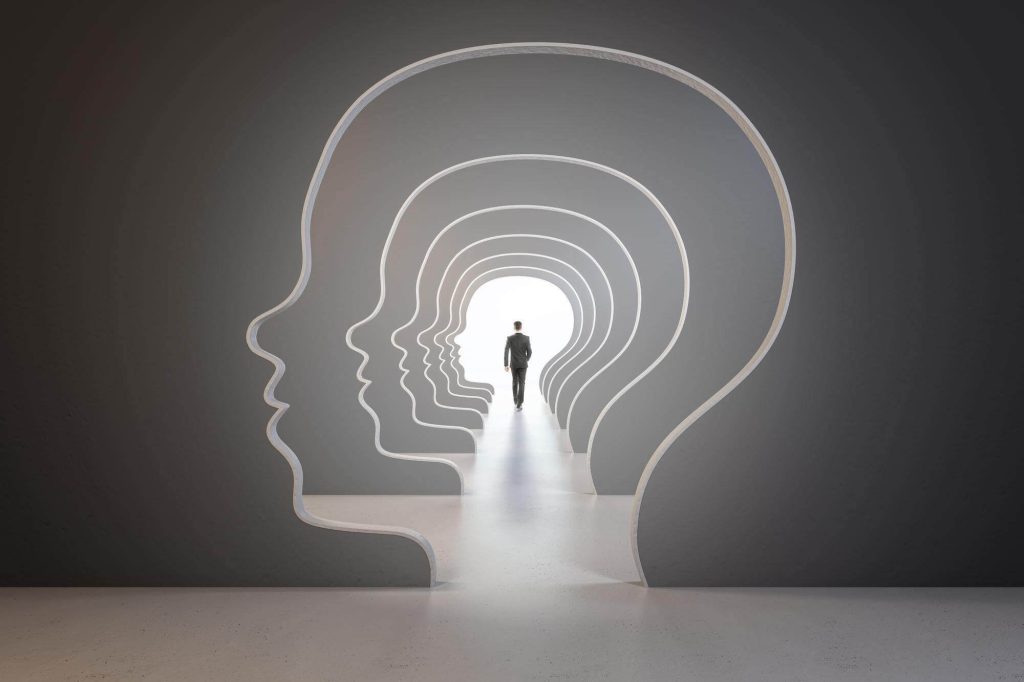 abstract-image-man-walking-through-head-outline-corridor-thinking-maze-solution-answer-search-concept-1